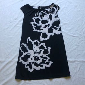 Black dress w/ two white flowers!